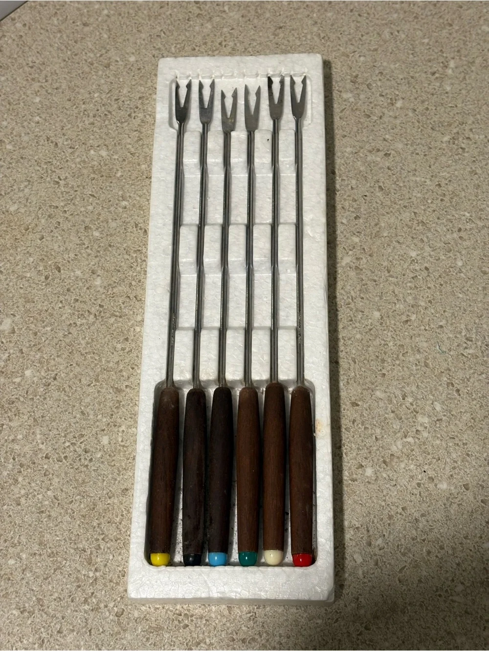 VTG Grants brand six-piece fondue fork set featuring rosewood handles
